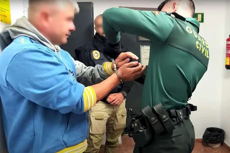 Police make an arrest as part of Operation Desert Light, the takedown of the European Super Cartel.